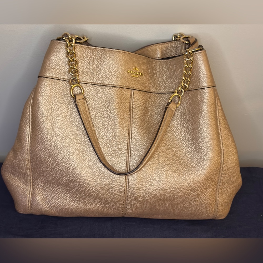 Coach Gold Lexy Chain Shoulder Bag
Leather